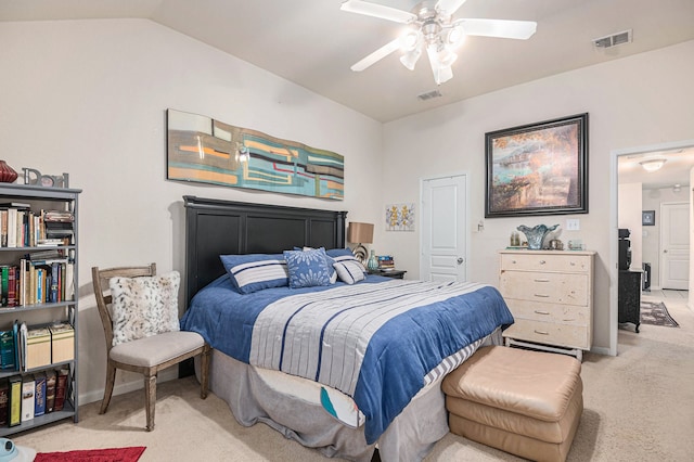 carpeted bedroom featuring lofted ceiling and ceiling fan