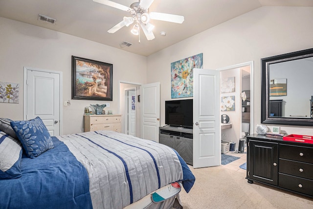 carpeted bedroom with vaulted ceiling and ceiling fan