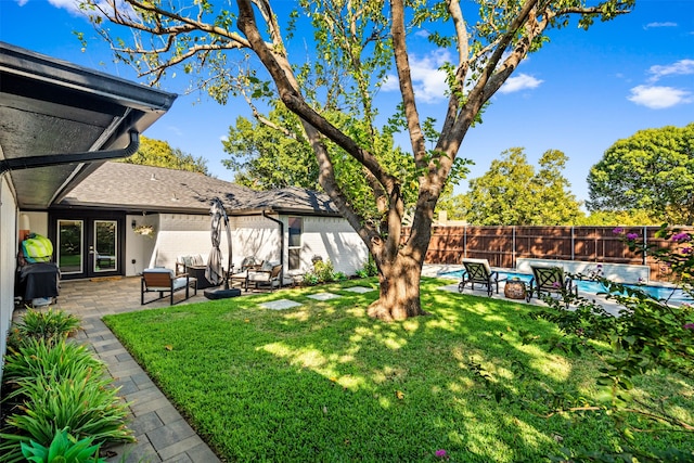 view of yard with a patio area