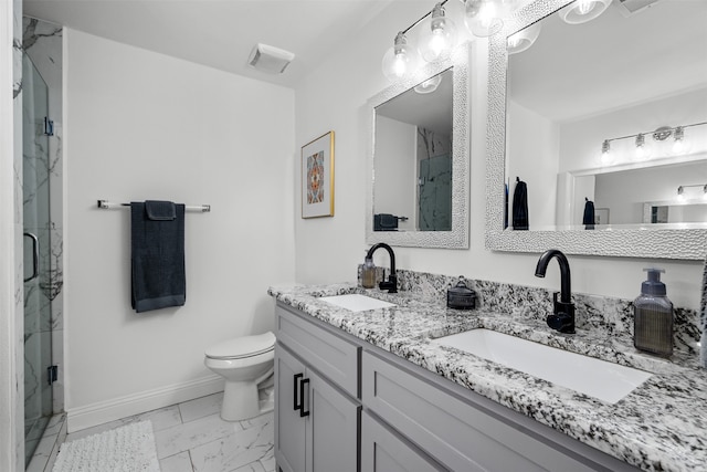 bathroom featuring walk in shower, vanity, and toilet