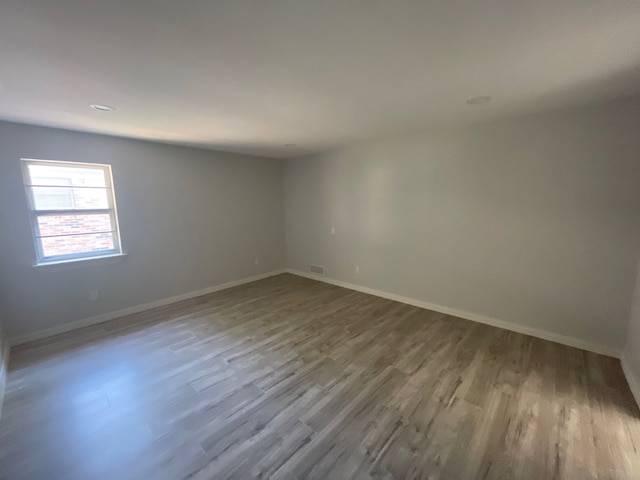 empty room with light wood-type flooring