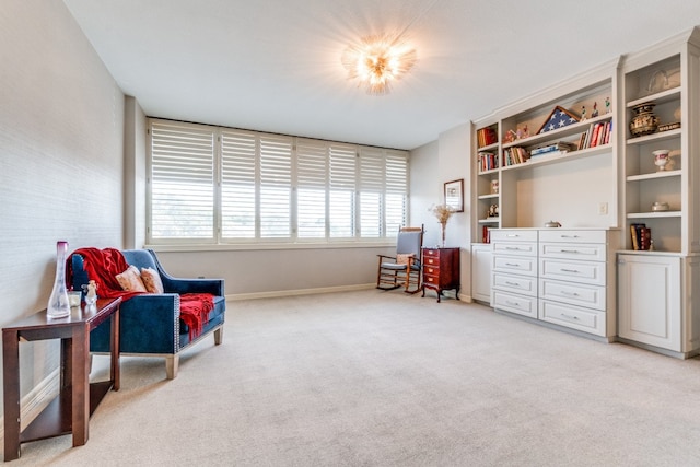 living area with light carpet