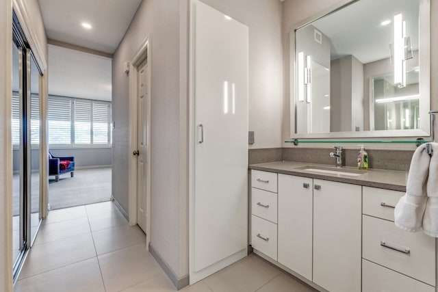 bathroom featuring vanity and tile patterned floors