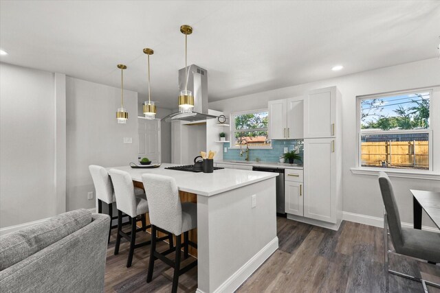 living room featuring hardwood / wood-style floors and ceiling fan