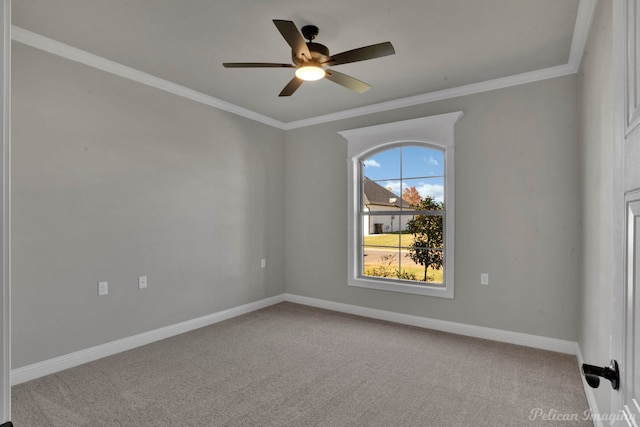 unfurnished room with carpet flooring, ceiling fan, and crown molding