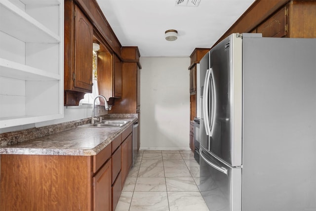 kitchen featuring sink and appliances with stainless steel finishes