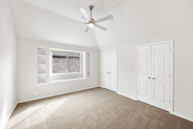 interior space featuring carpet flooring and a chandelier