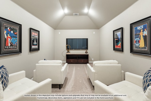 carpeted cinema room featuring lofted ceiling