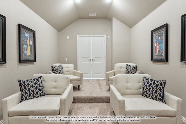 living area featuring lofted ceiling and carpet flooring