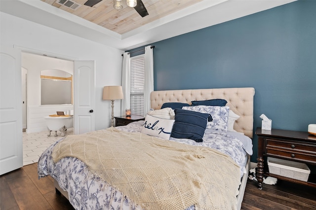 bedroom featuring dark wood-type flooring, wooden ceiling, and ceiling fan