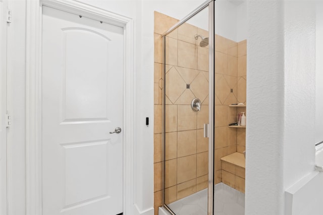 bathroom featuring walk in shower