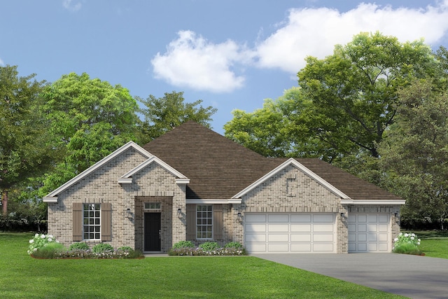 view of front of house featuring a front lawn and a garage