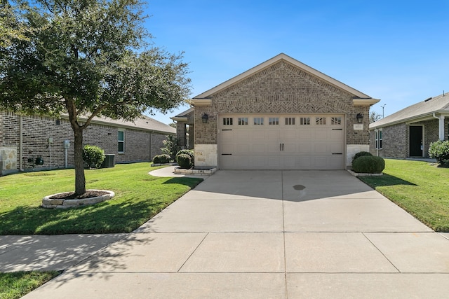 ranch-style house with a garage and a front lawn