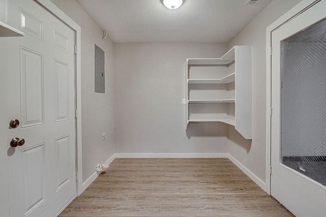 417 Lena Ln, Burleson, TX 76028 - interior space featuring light wood-style flooring and electric panel