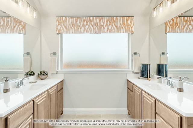 bathroom with vanity and tile patterned floors