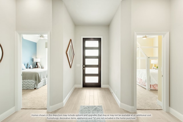 entrance foyer with light hardwood / wood-style flooring