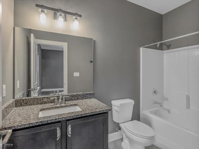 full bathroom with shower / washtub combination, toilet, and vanity