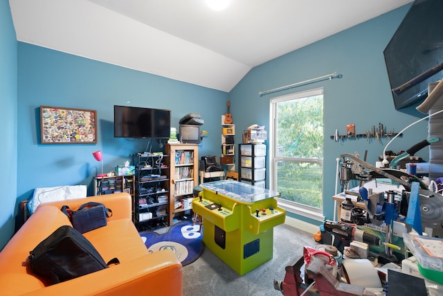 rec room with lofted ceiling, a wealth of natural light, and carpet floors