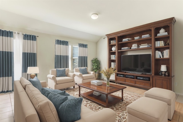 tiled living room featuring lofted ceiling