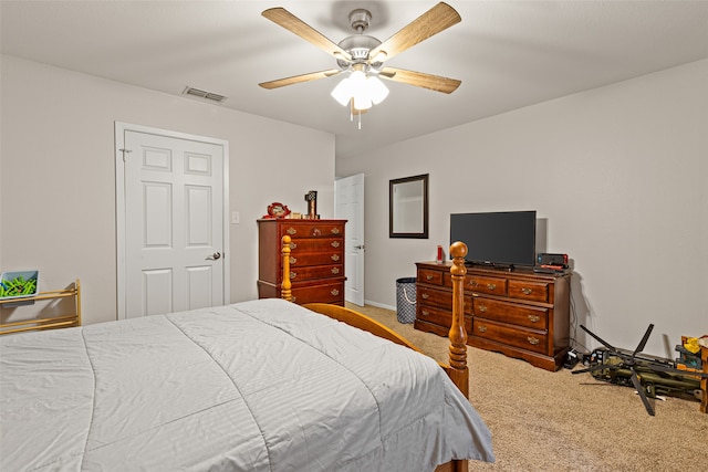 bedroom featuring carpet and ceiling fan