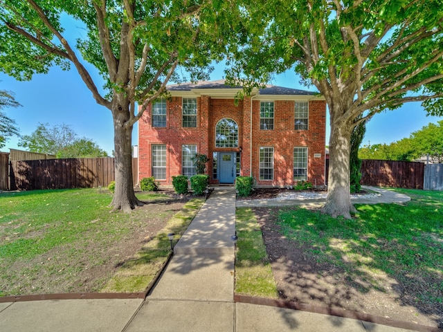 view of front of house with a front lawn