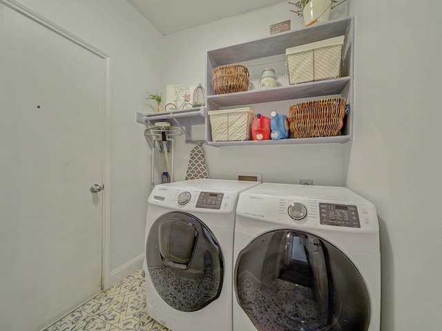 laundry area with washer and clothes dryer