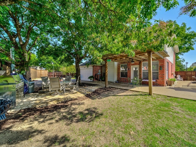 view of yard featuring a patio and a pergola