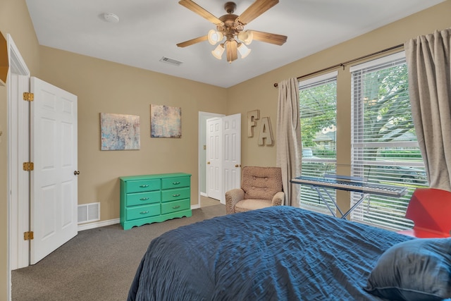 carpeted bedroom with ceiling fan