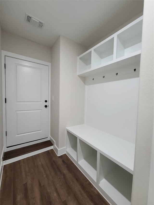 mudroom with dark hardwood / wood-style floors