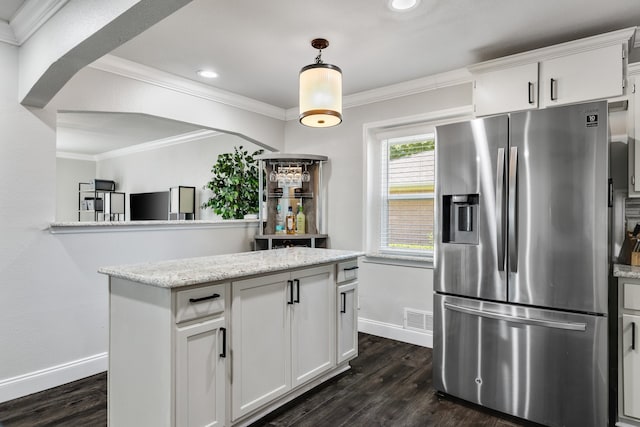 kitchen with white cabinets, stainless steel refrigerator with ice dispenser, dark hardwood / wood-style flooring, and light stone counters