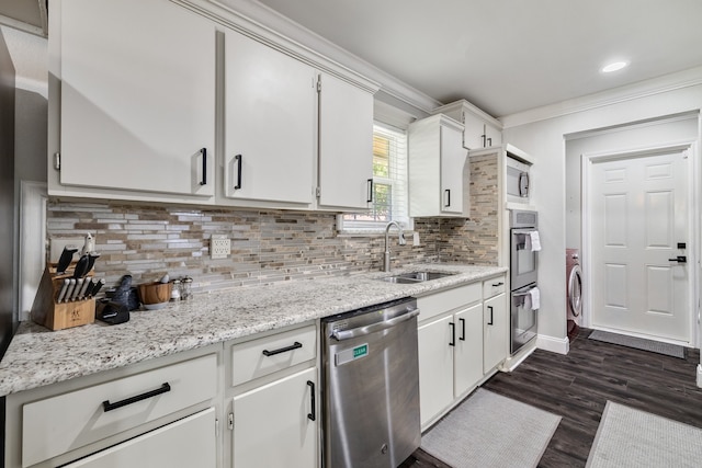 kitchen with dishwasher, sink, dark hardwood / wood-style flooring, and white cabinetry