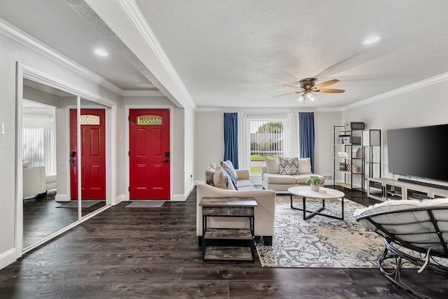 living room with ceiling fan, a textured ceiling, crown molding, and dark wood-type flooring