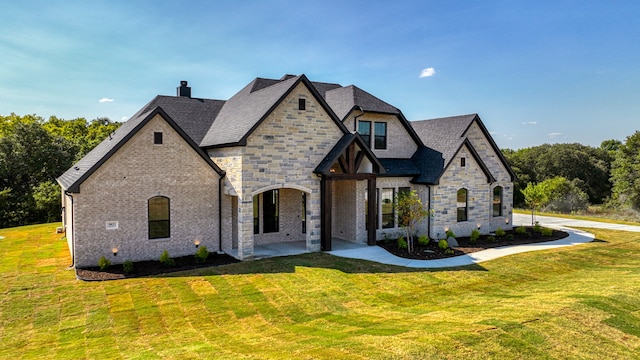 view of front of house with a front lawn