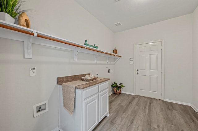 laundry area with washer hookup, hookup for an electric dryer, and light wood-type flooring