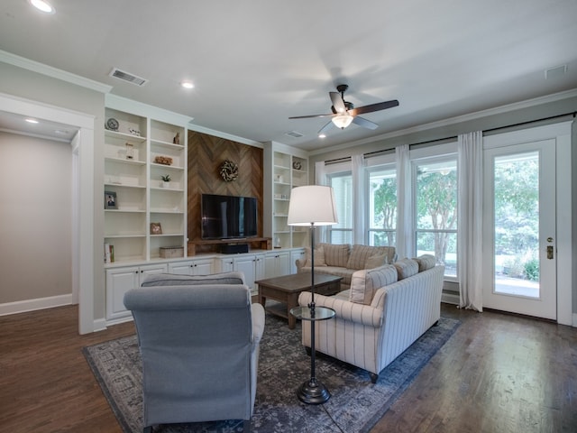 living room featuring crown molding, ceiling fan, and dark hardwood / wood-style flooring