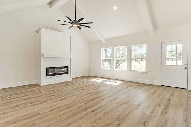 unfurnished living room featuring high vaulted ceiling, beam ceiling, light wood-type flooring, and ceiling fan