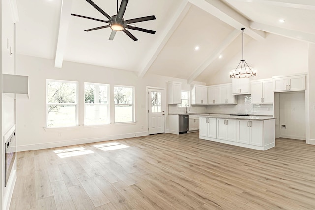 kitchen with white cabinets, pendant lighting, dishwasher, a center island, and light wood-type flooring