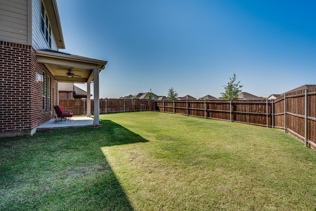3604 Hidden Hollow Dr, Grand Prairie, TX 76065 - view of yard featuring a patio, a fenced backyard, and a ceiling fan