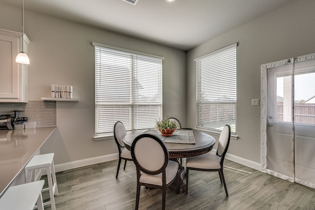 dining room featuring hardwood / wood-style flooring