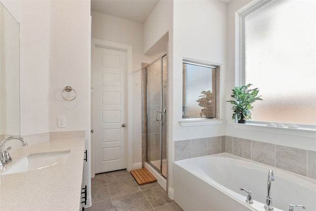 bathroom with vanity, plus walk in shower, and tile patterned floors