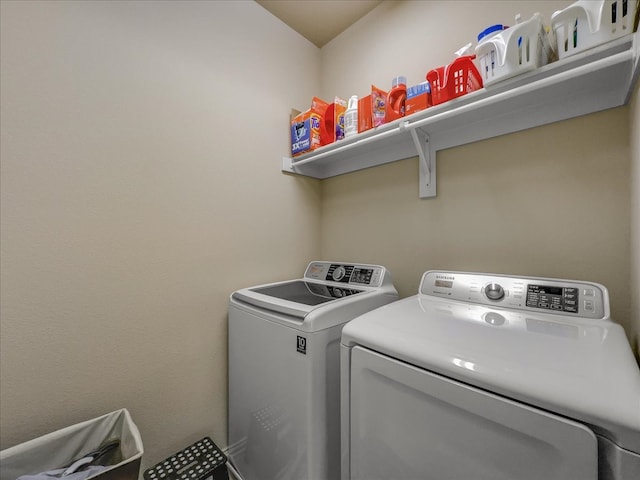 laundry area with washing machine and dryer