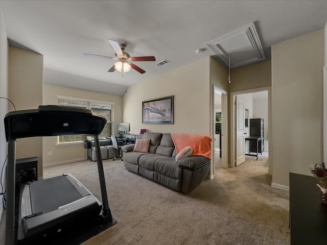 exercise area featuring ceiling fan, a wealth of natural light, and light carpet