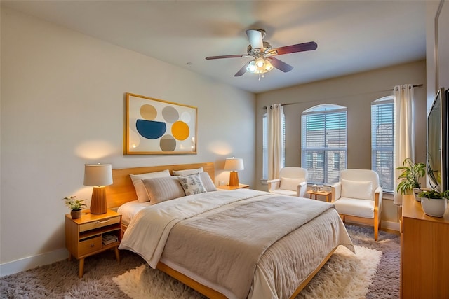 carpeted bedroom featuring ceiling fan