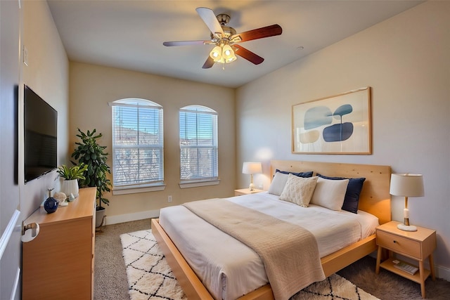 bedroom featuring light carpet and ceiling fan