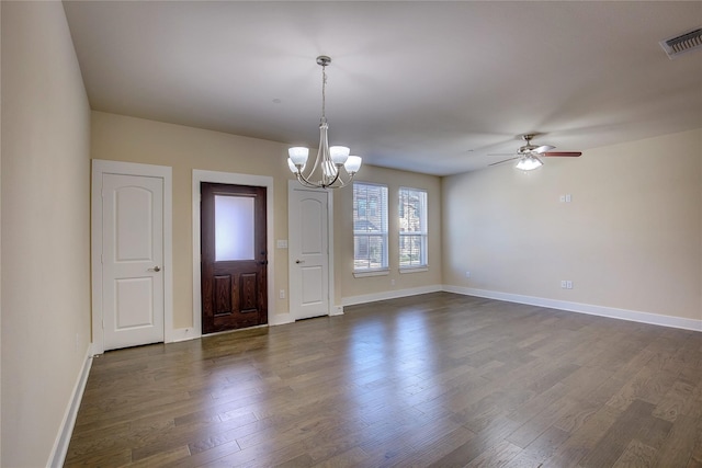 entrance foyer featuring ceiling fan with notable chandelier and dark hardwood / wood-style flooring