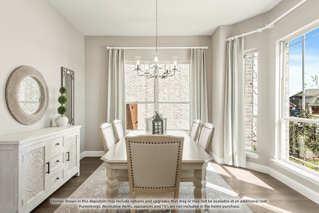 dining area with a wealth of natural light, dark wood-type flooring, and a chandelier