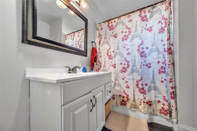 bathroom featuring vanity and crown molding