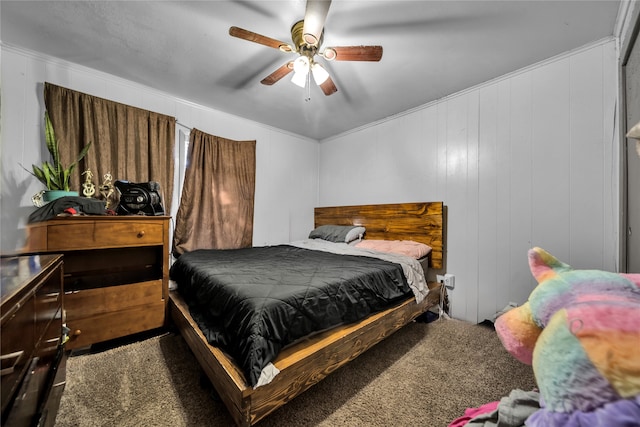 bedroom featuring wooden walls, crown molding, carpet flooring, and ceiling fan