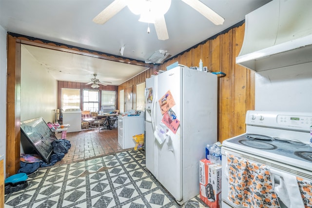 kitchen with ceiling fan, white appliances, ventilation hood, and washer / dryer