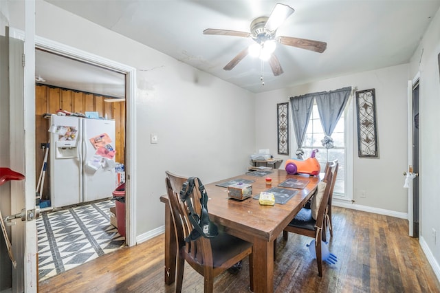 dining room featuring ceiling fan and hardwood / wood-style floors